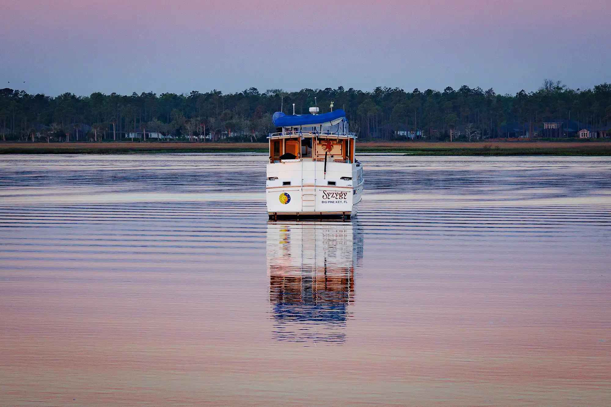 Escaping the city's wake for a peaceful anchorage.
