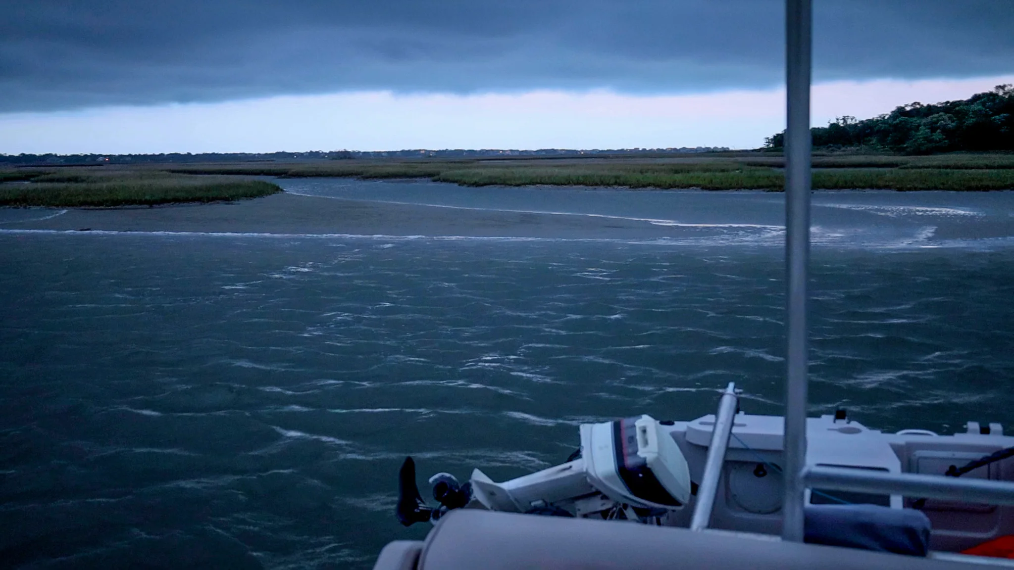 Our Loop boat anchored in a storm in Swansboro, NC.