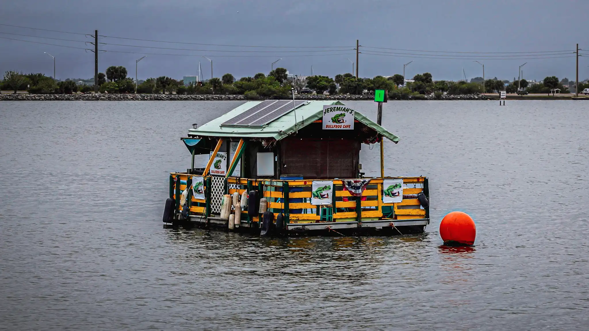 Jeremiah's Bullfrog Cafe floating on the water.
