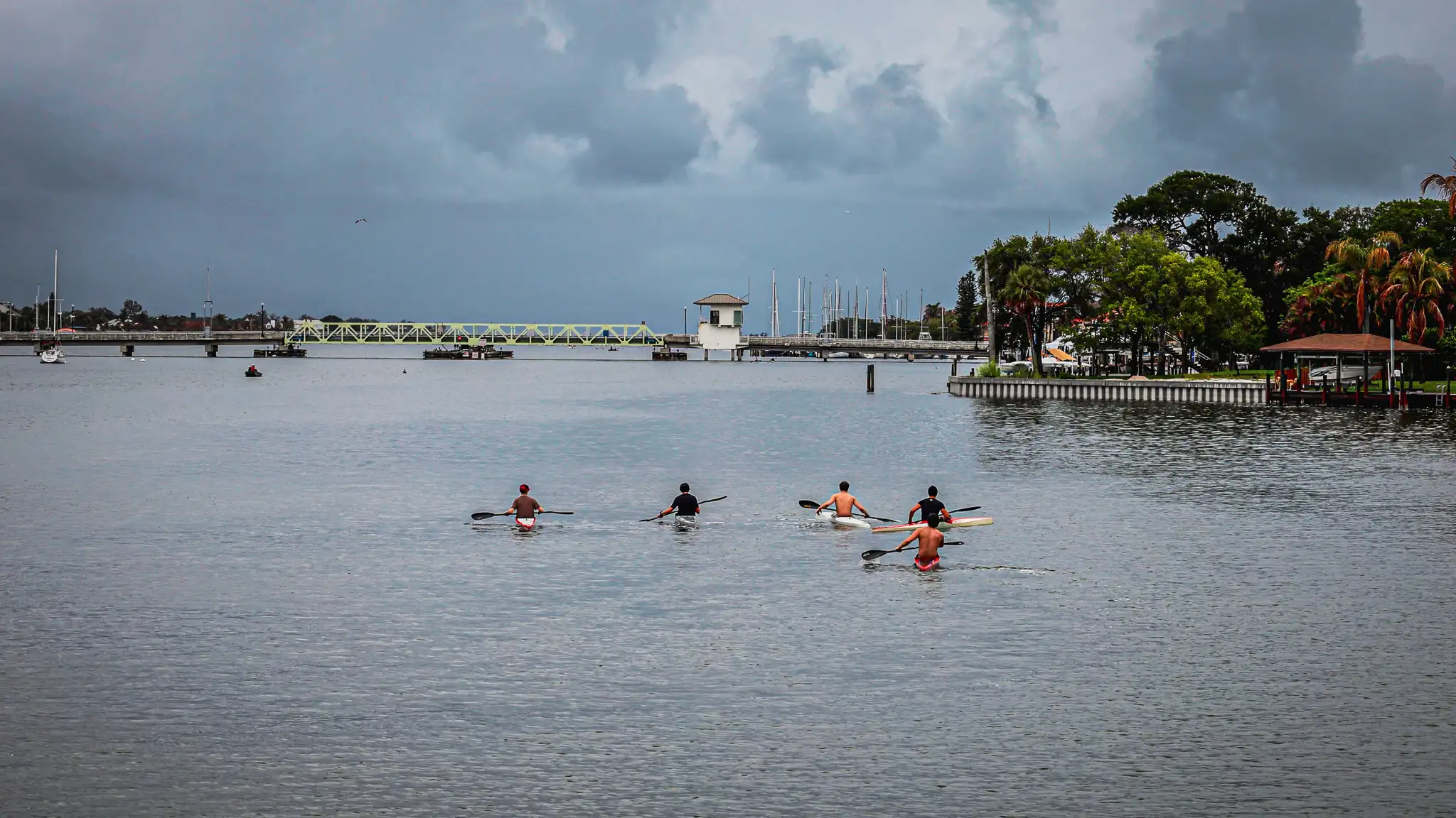 Kayakers and the Mathers Bridge on the Banana River in Indian Harbour Beach, Florida.