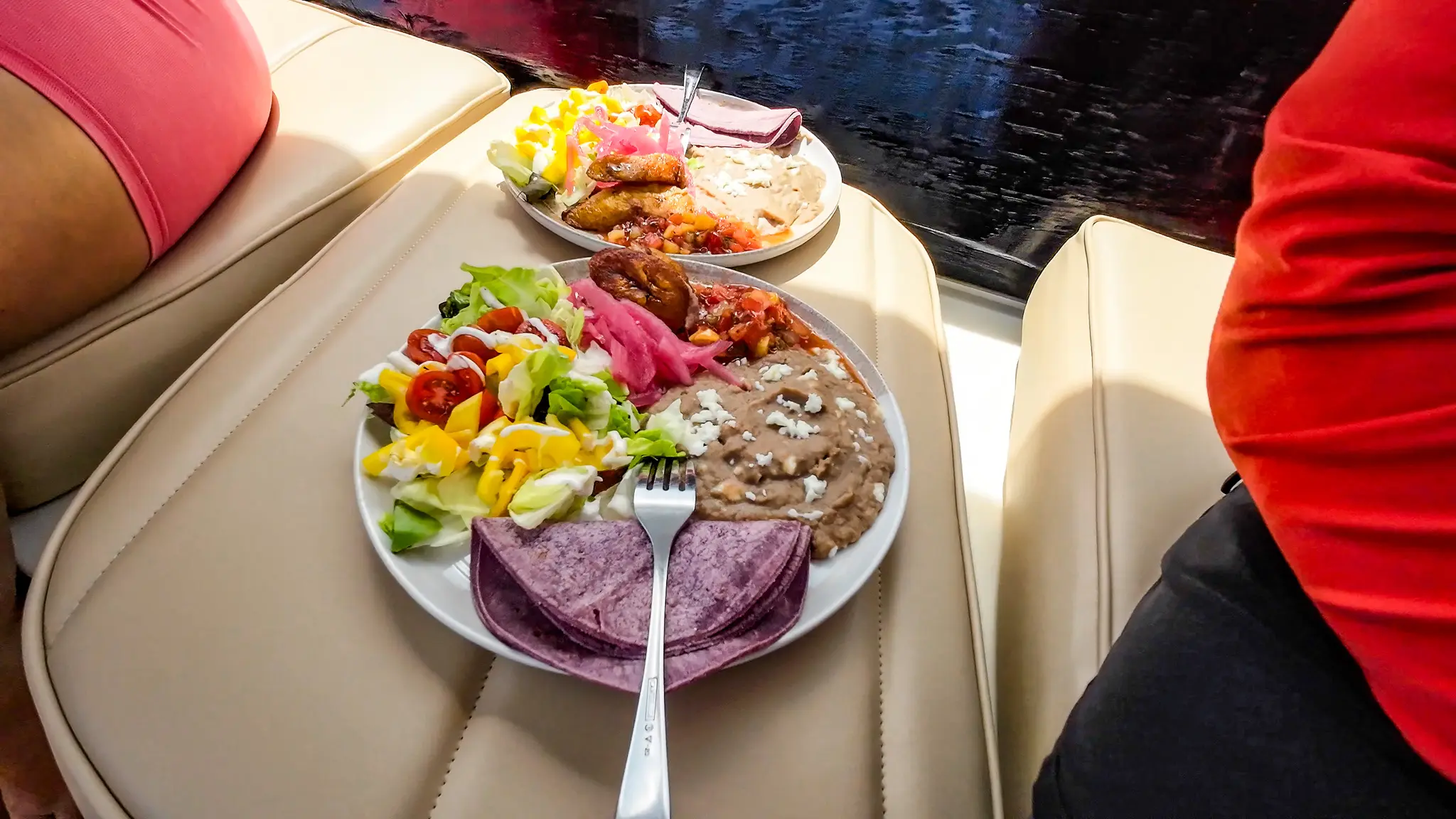 Lunch on the Loop - blue corn tortillas, a small salad, refried beans, plantains, chunky mango salsa, and pickled red onions.