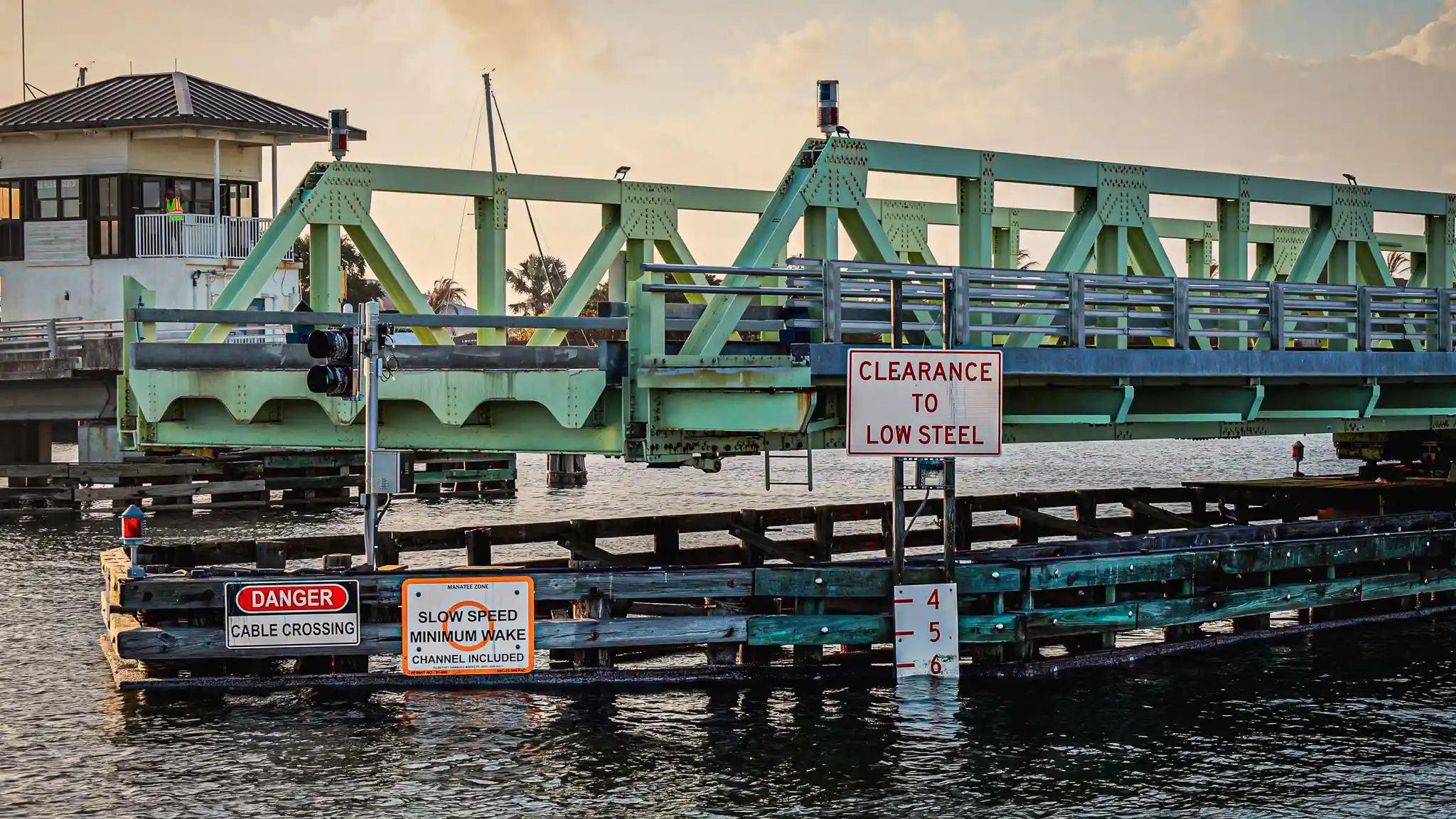 Mathers Swinng Bridge, a light green steel bridge.