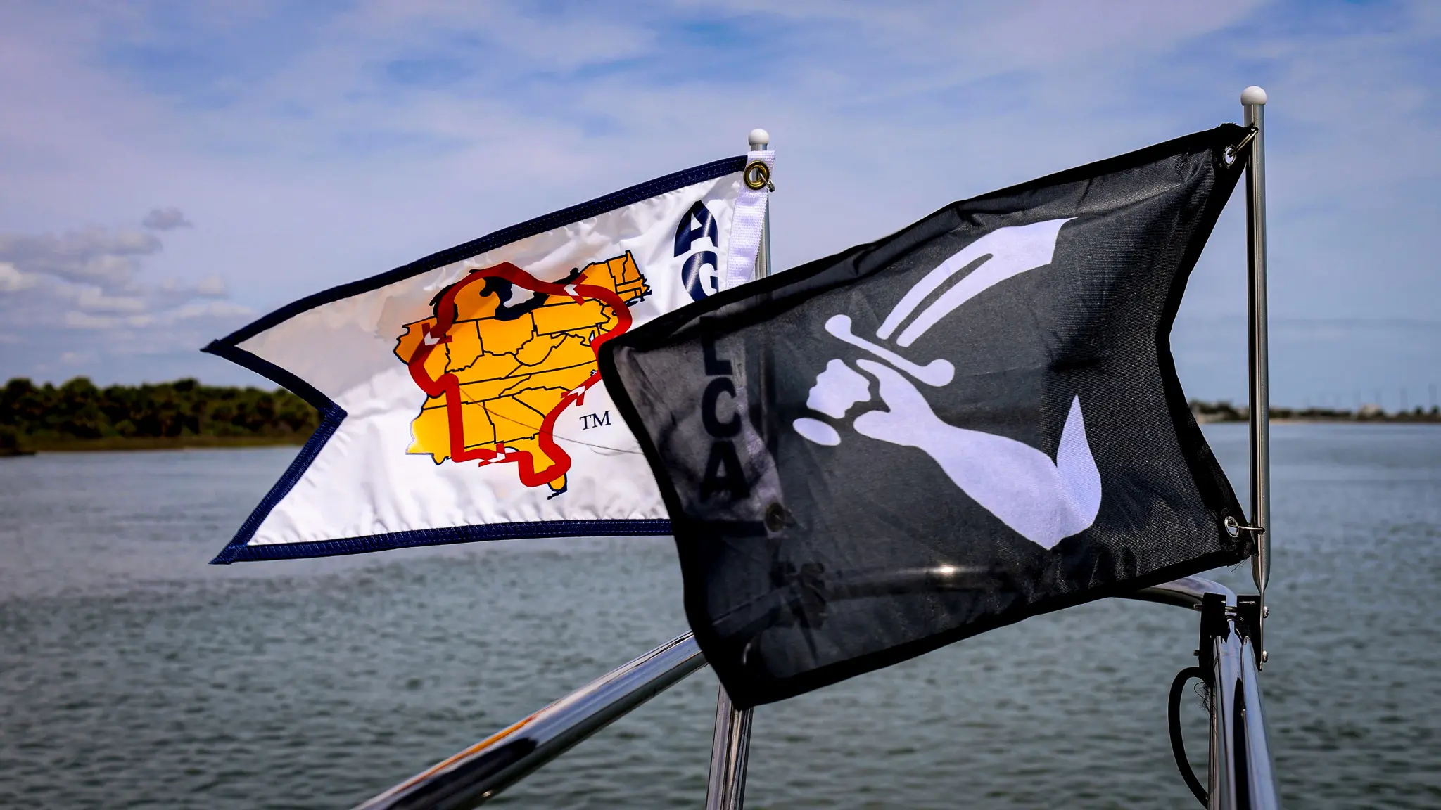 Our two burgees - one is the pirate Thomas Tew's flag!