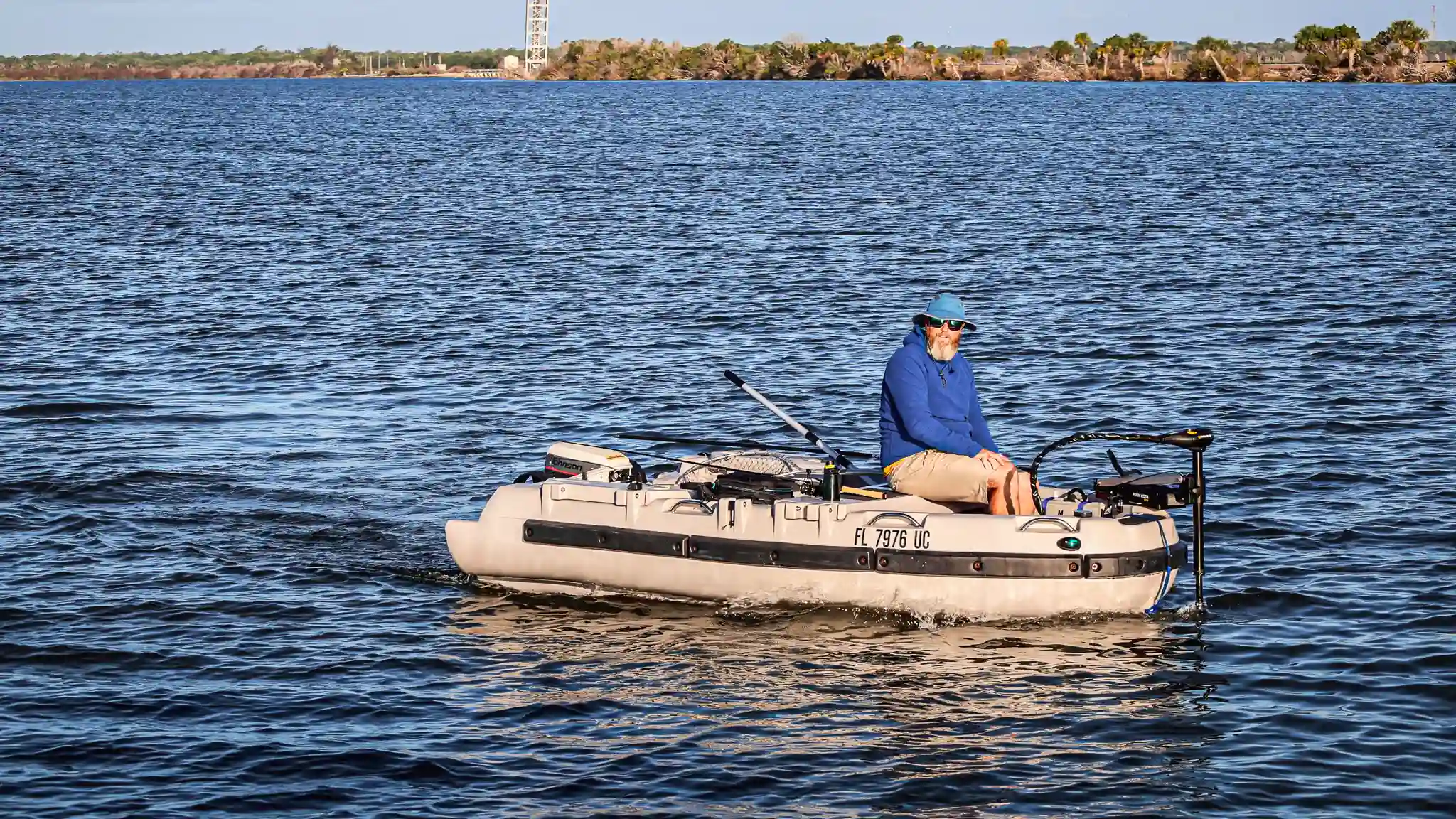 Tom fishing with the trolling motor on our Mantus dinghy.