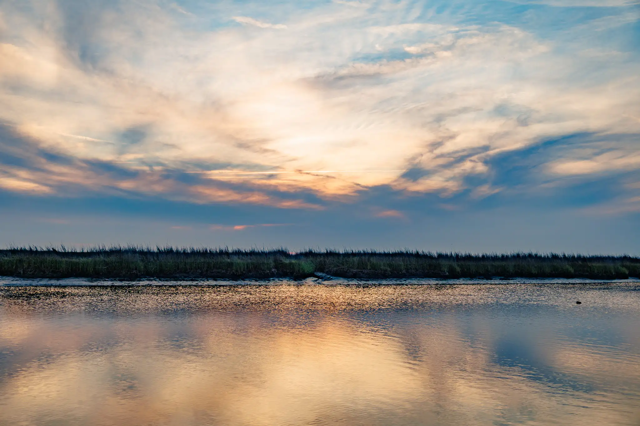 A sultry sunset over the marshes around St. Simons Island, Georgia.