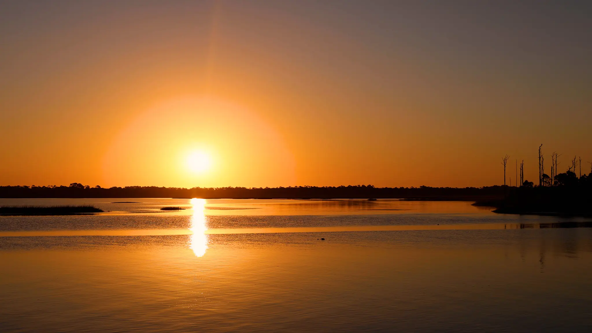Gorgeous orange sunset over the Intracoastal Waterway.