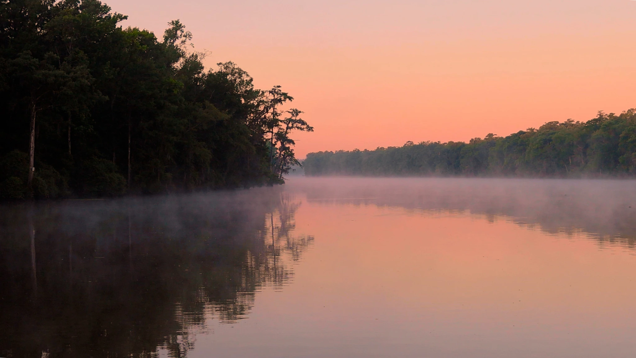 A peachy sunrise over our South Carolina anchorage.