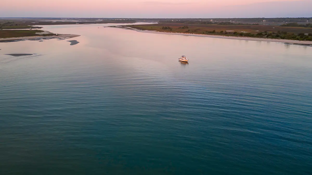 Our Loop boat from an overhead drone shot, anchored at Masonboro Island.